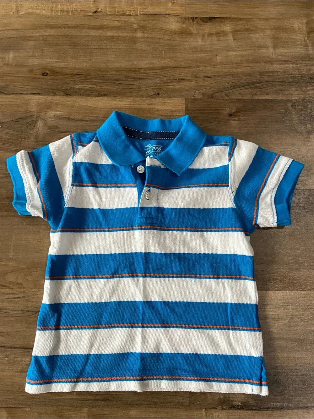 Blue & White Striped Polo with Orange Shorts
